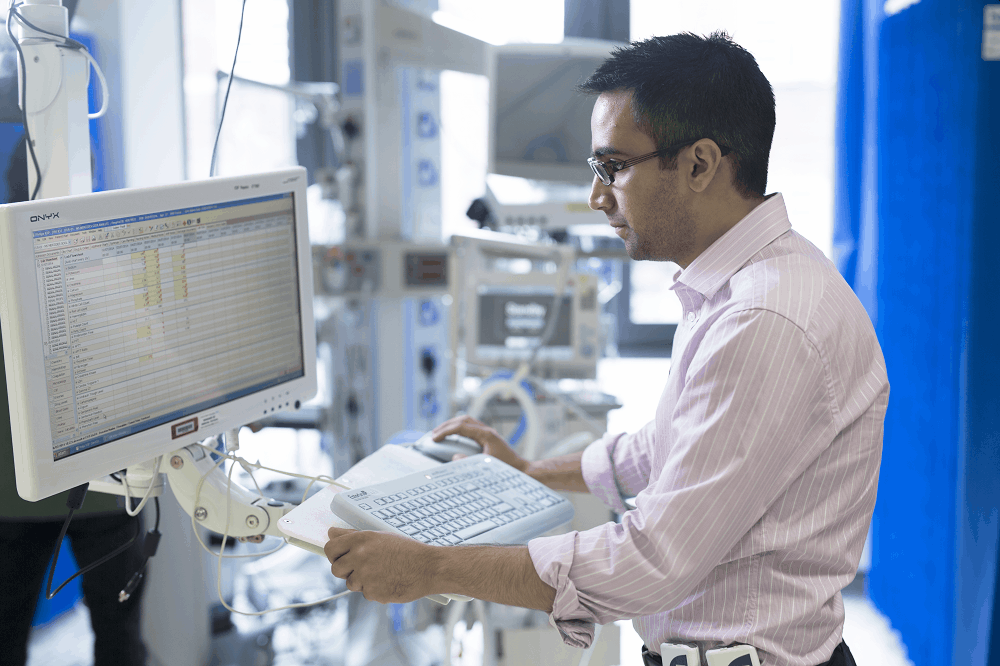 image of hospital pharmacist at a computer