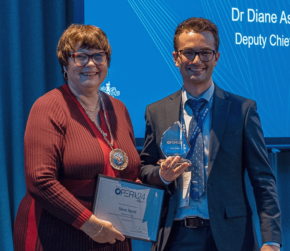 Dr Sion Scott receiving his OPERA Award from RPS President Professor Claire Anderson