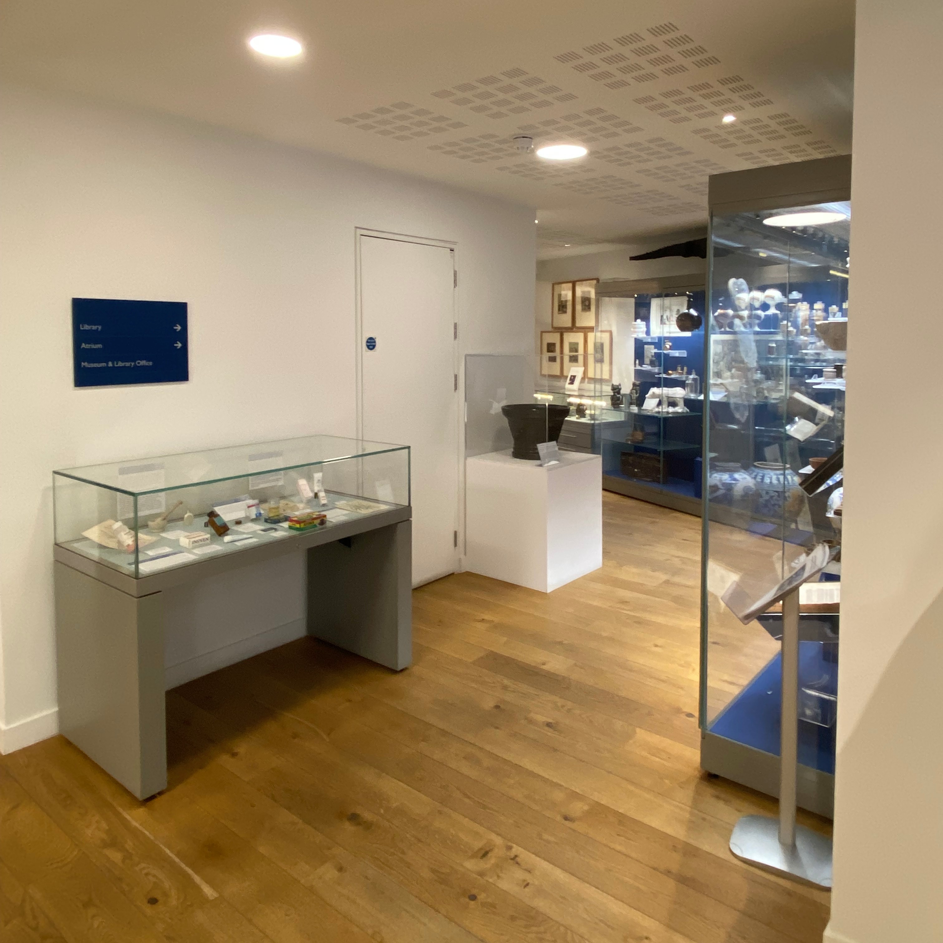 View of museum section two with cases and table-top display