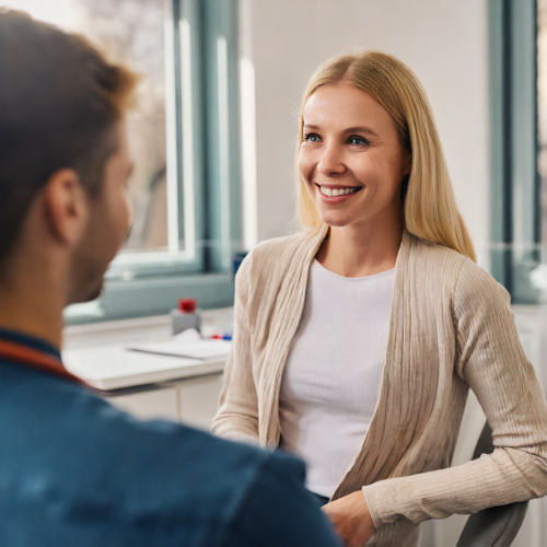 Pharmacist talking to her patient in clinic